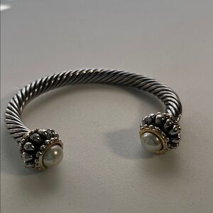 Heavy sterling silver style cable cuff bracelet with pearl ends. Classic look
